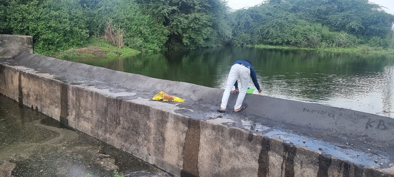 Fetching Water by the Dam